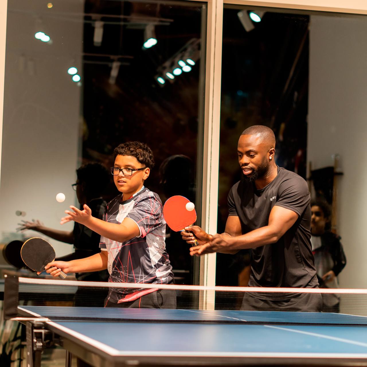 Coach Ademola table tennis coaching